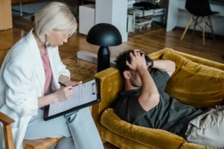 “Therapist explaining Dialectical Behaviour Therapy during a psychological therapy session”